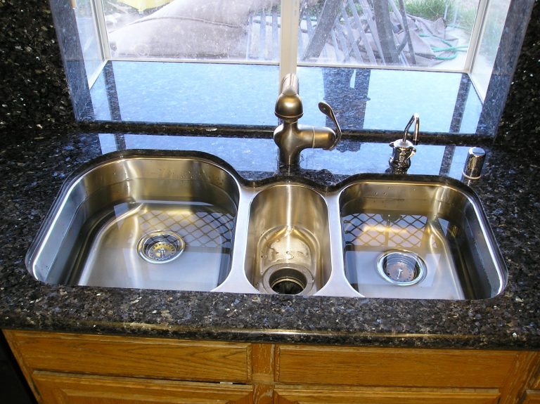 Stainless sink set in granite countertops