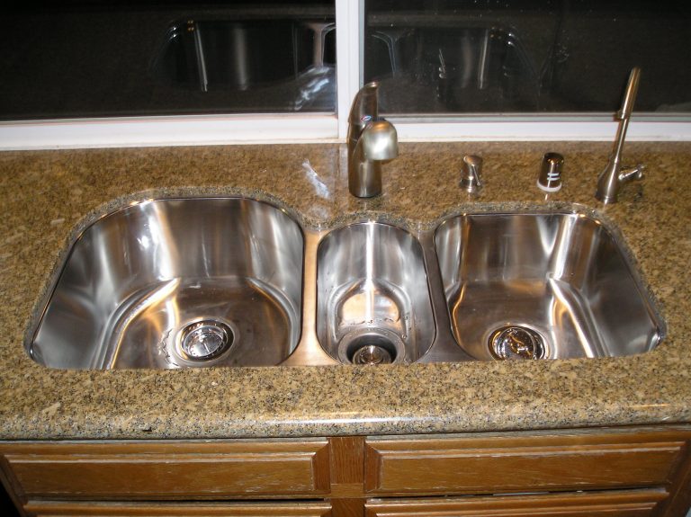 Polished granite edge around an undermount sink