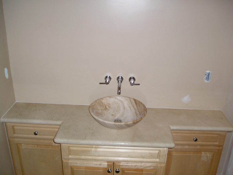 Stone vanity countertop with sink cutouts