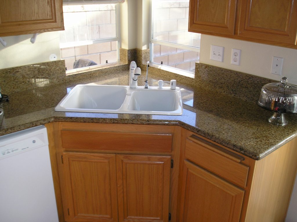 Granite countertops Riverside on a kitchen island and perimeter