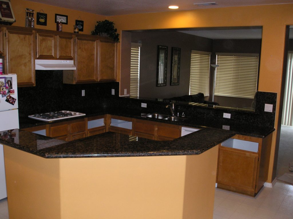 Granite countertops whittier with a full backsplash