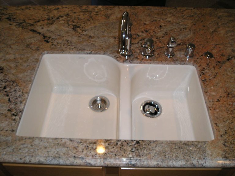 Polished granite edge around an undermount sink