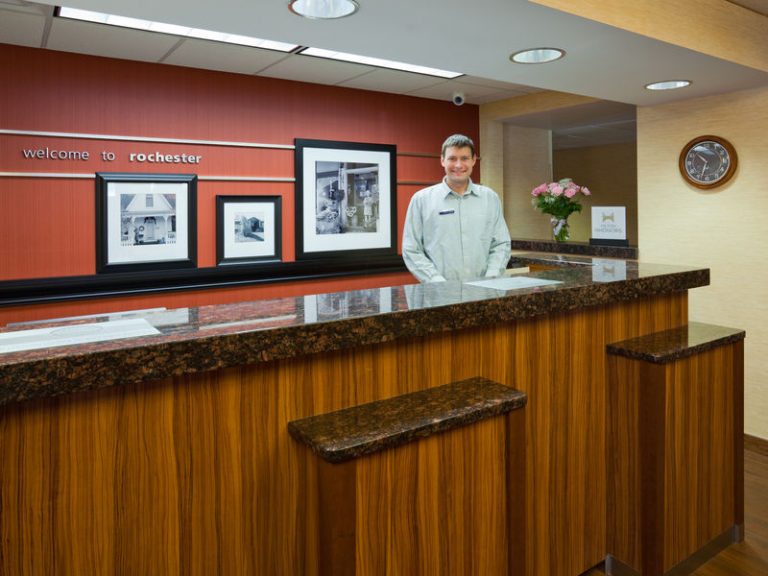 Example of a hotel front desk with granite
