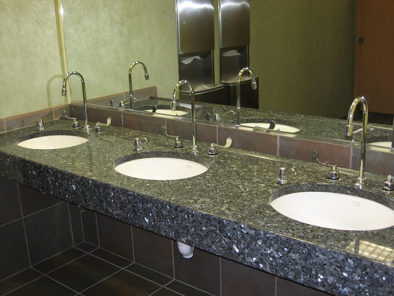 Example of commercial restroom vanities in granite